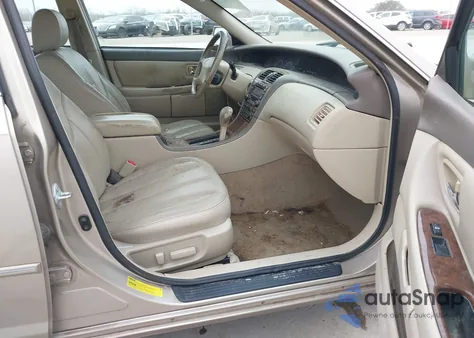 2000 Toyota Avalon Xls z USA, uszkodzony, nr VIN 4T1BF28B0YU024842